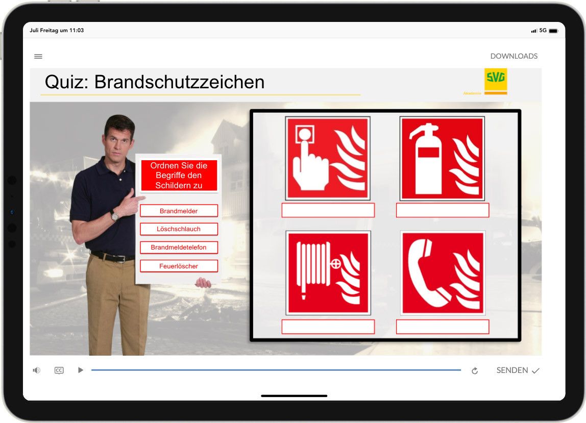 Brandschutzzeichen bei der Unterweisung von Mitarbeitern